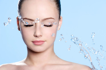Beautiful  face with splashes of water