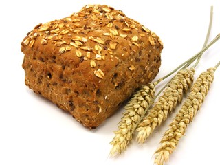 Brown bread & wheat on a white background