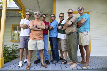 Group of serious middle aged men