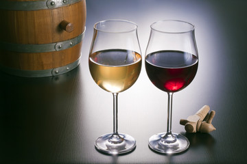 Delicious wines, wooden barrel and spigot.