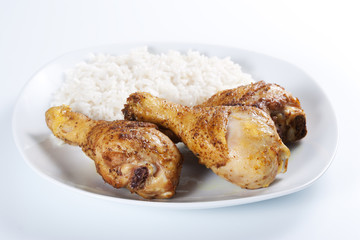 Roasted chicken legs with boiled rice