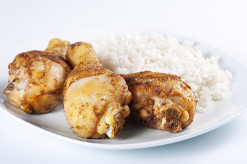 Roasted chicken legs with boiled rice