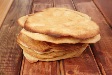 big pile of baked cakes