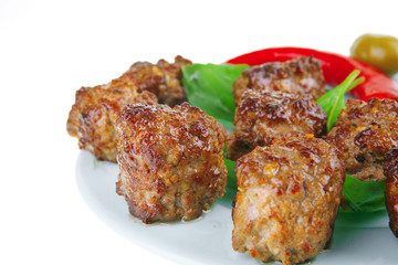 served meat cutlets with basil