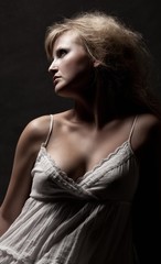 Beautiful studio portrait in dark tones of model