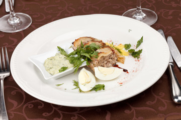meat pie with egg and sauce