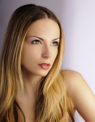 Fototapeta premium Beautiful young woman staring intensely at something