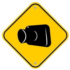 Yellow sign with camera symbol