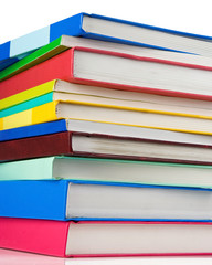 pile of new books isolated on white