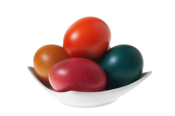 A Bunch of Colorful Easter Eggs On White Plate