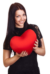 Woman holding Valentines Day heart sign with copy space