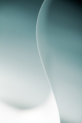 black white macro picture of a curved sheet of paper