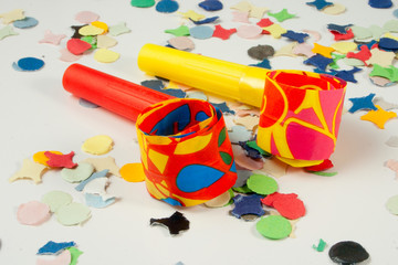 Two colored whistles