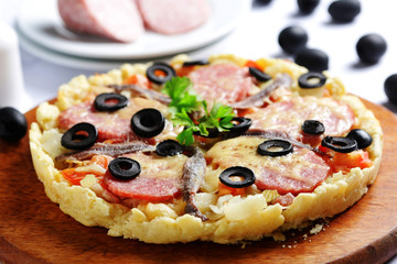 pizza with smoked sausage sprat cheese and olives
