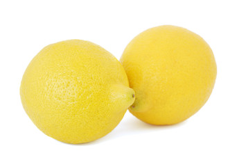 Two lemons isolated on white background
