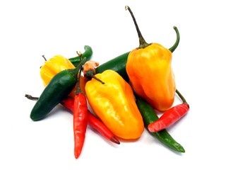 A selection of mixed chillies on a white background