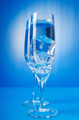 Water in the glass against gradient background