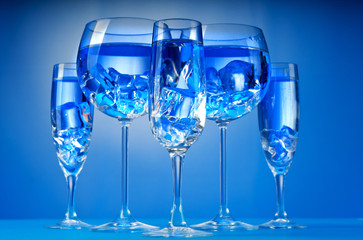 Water in the glass against gradient background