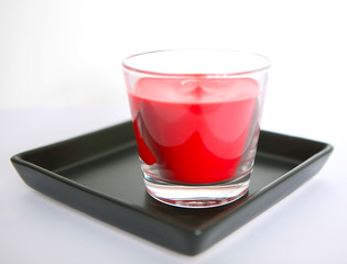 Red aromatic candle