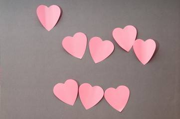 Heart shaped sticky notes on the background