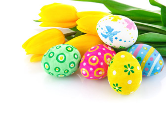 easter eggs with yellow tulip flowers