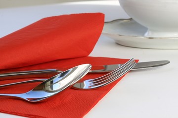 cutlery on red napkin