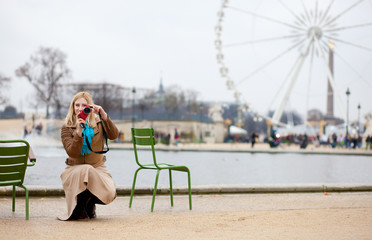 Tourist in Paris making photo