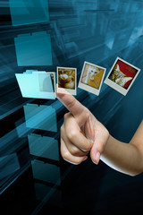 a woman hand choice a folder on a screen