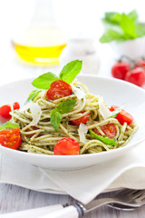 spaghetti with  pesto and tomato