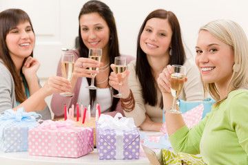 Fototapeta na wymiar Birthday party - woman drink champagne