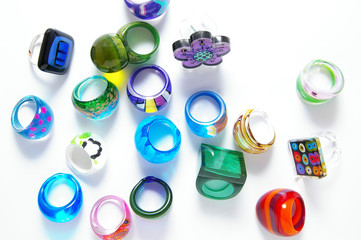 assortment of colorful womens unique plastic rings