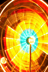 Obraz premium Ferris Wheel Motion at Night