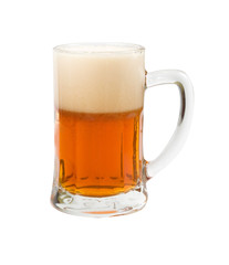 beer is poured into a glass isolated on white background