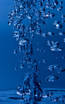 blue splash of water and bubbles with a splash