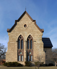 Fototapeta na wymiar old stone church with gothic windows