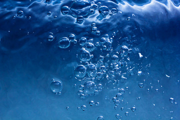 blue water with bubbles and blue drops background