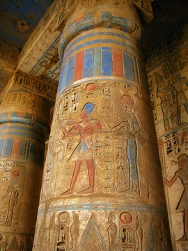 Polychromed columns in Medinet Habu temple. Luxor, Egypt