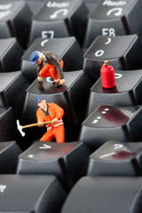 Fototapeta premium Workers repairing keyboard