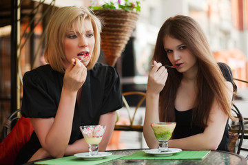 Young women eating an ice cream