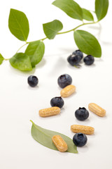Bilberry pills and berries