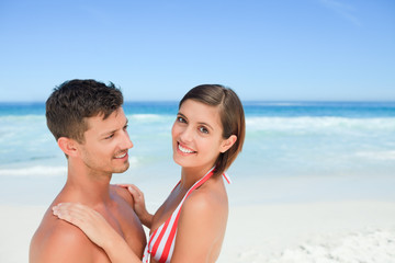 Fototapeta premium Lovely lovers at the beach