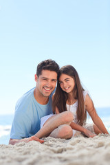 Fototapeta premium Father with his daughter at the beach