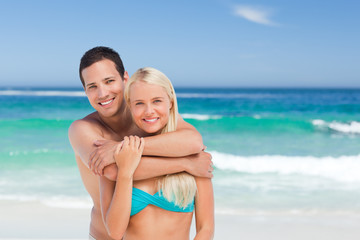 Fototapeta premium Enamored couple on the beach