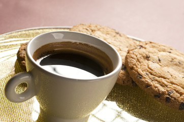Coffee cup and chocolate cookies