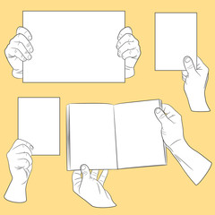 Set of human hands with paper