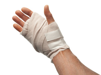 Injured male hand wrapped with bandage, isolated