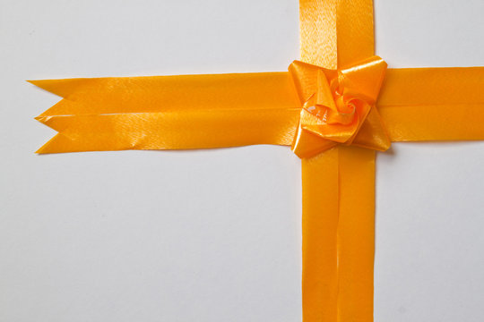 Beautiful Orange Bow On White Background