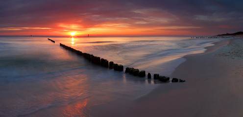 Beautiful sunrise at baltic beach