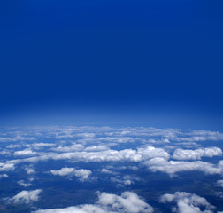 Fototapeta na wymiar Aerial view of the beautiful blue sky with white clouds