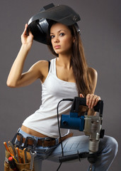Fototapeta na wymiar sexy young woman construction worker